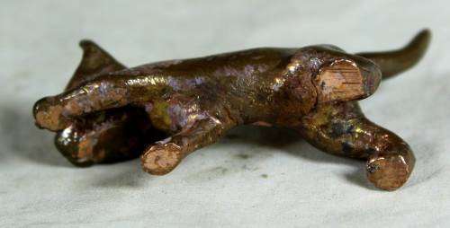 Miniature brass feral cat