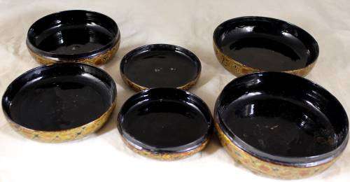 Set of three graduated containers