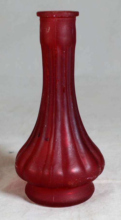 Small red ornate vase
