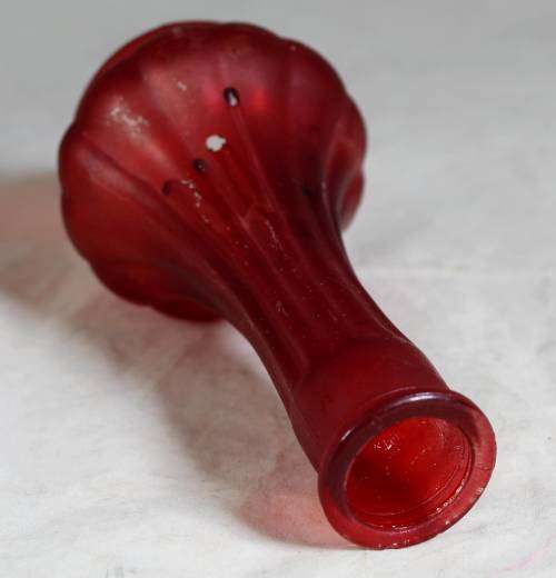 Small red ornate vase