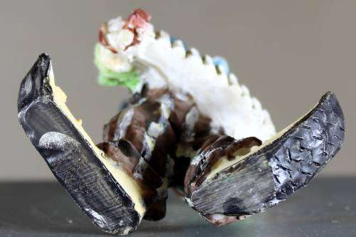 Small clown figurine - playing a concertina