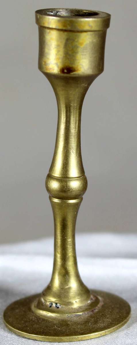 Miniature brass candle holder