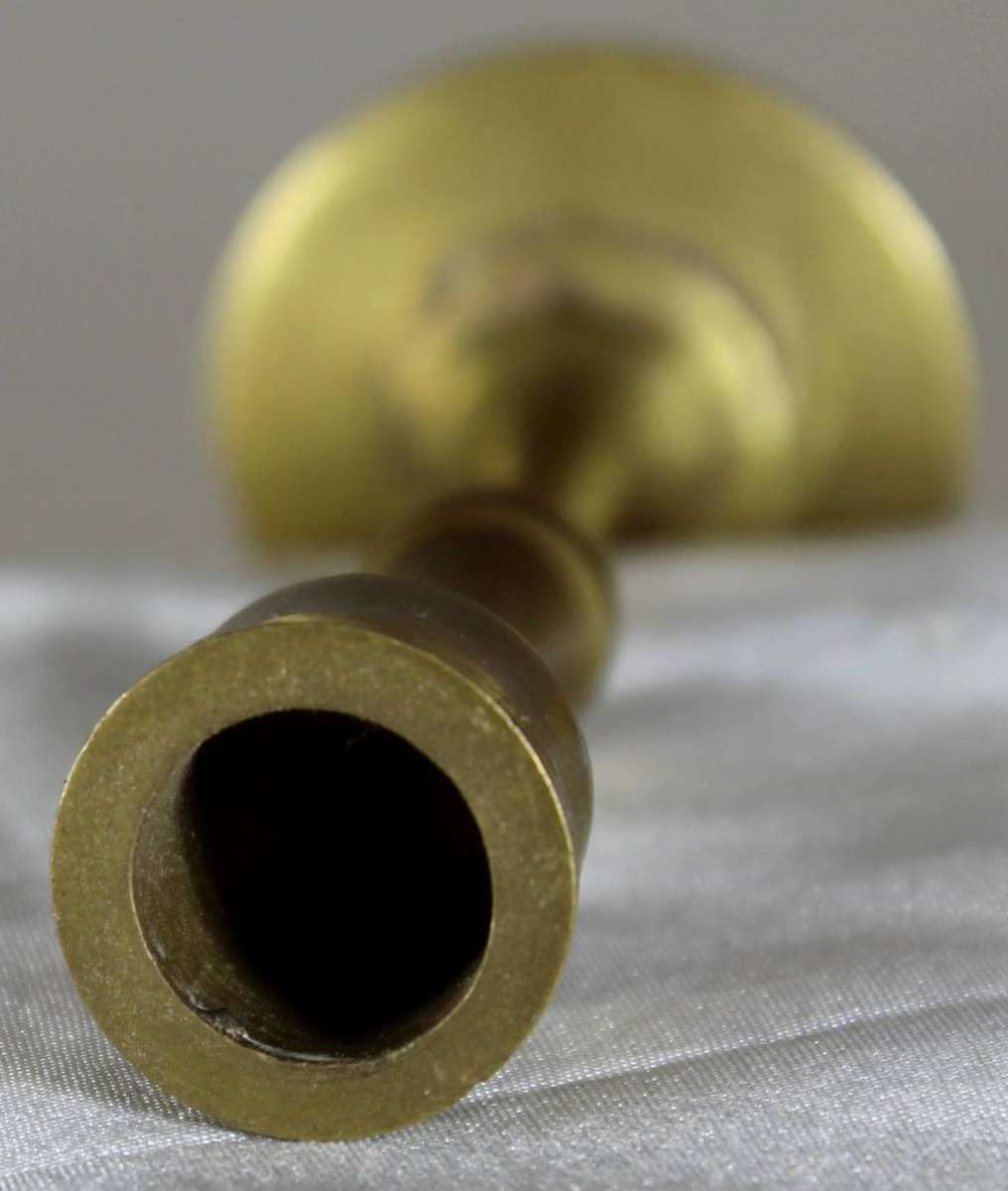 Miniature brass candle holder