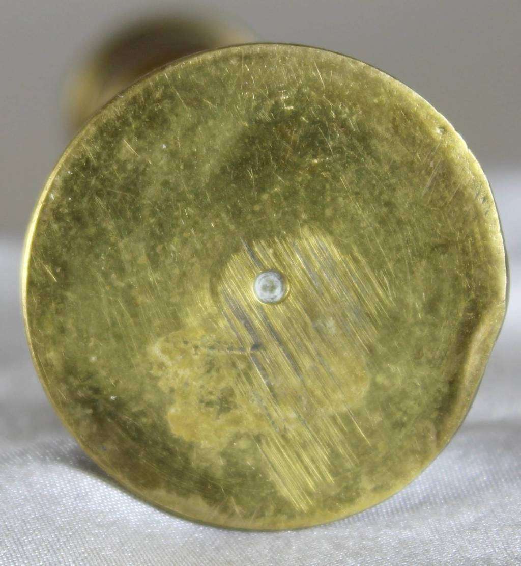 Miniature brass candle holder