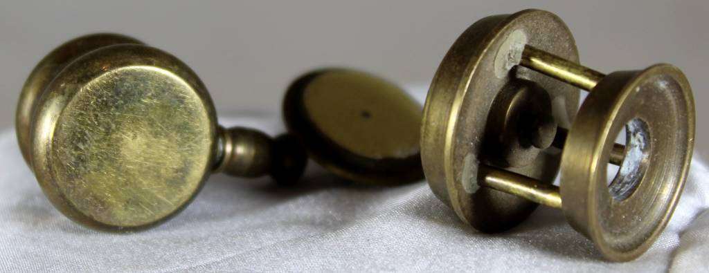 Miniature brass pot on gas burner