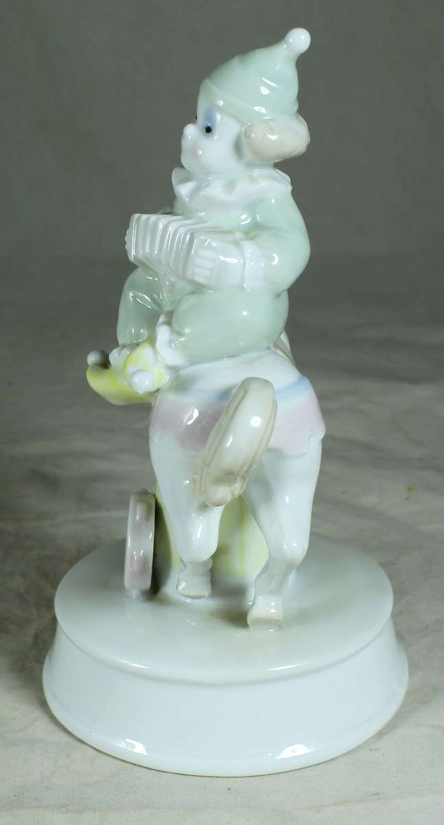 Clown on Carousel Horse