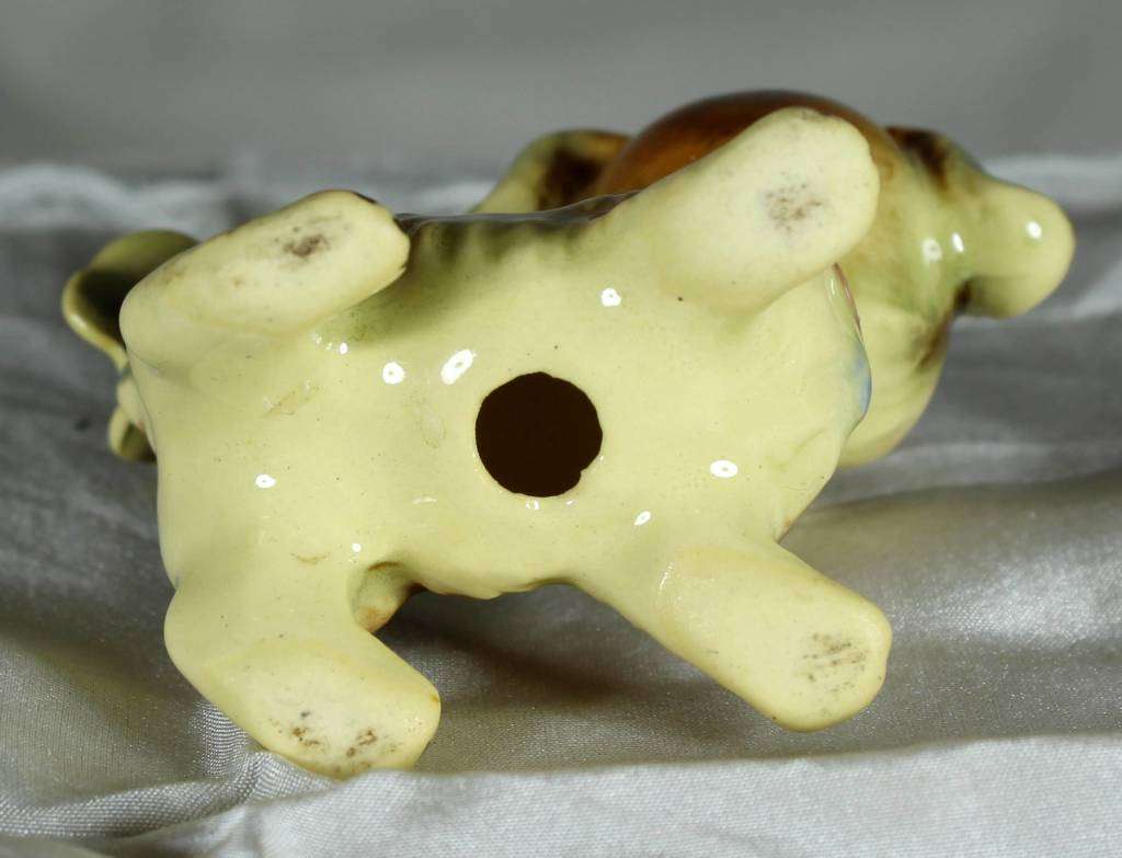 Puppy with butterfly on tail