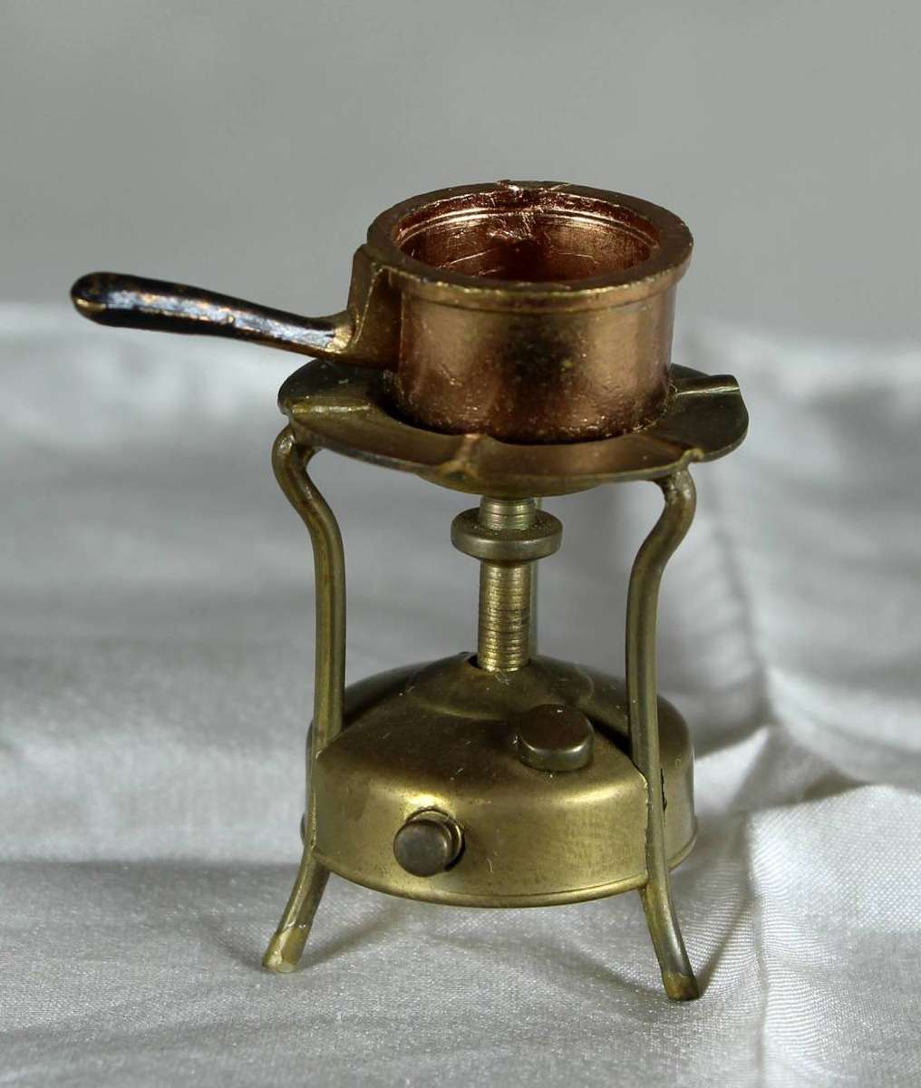 Miniature brass gas stove with pot