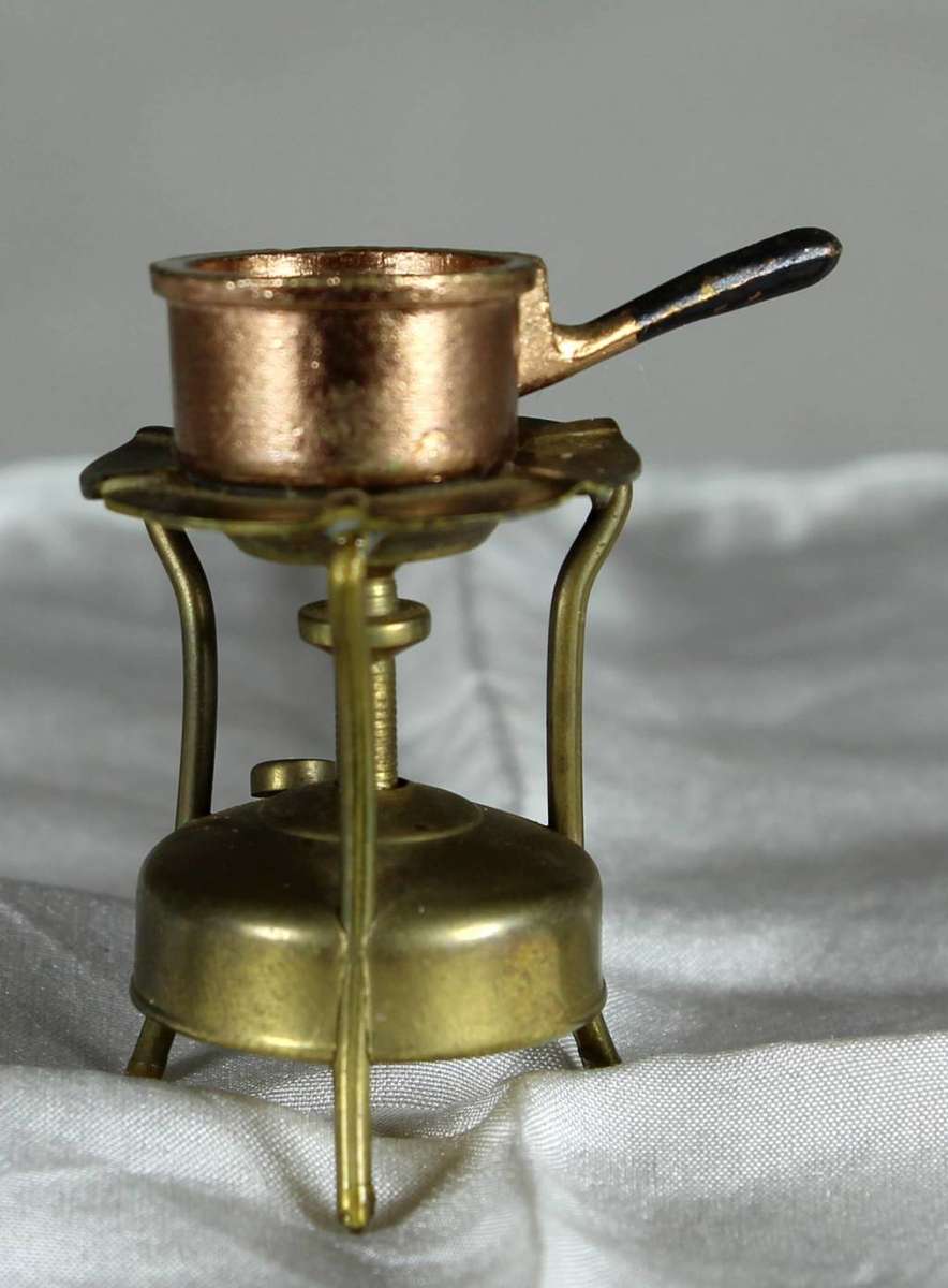 Miniature brass gas stove with pot