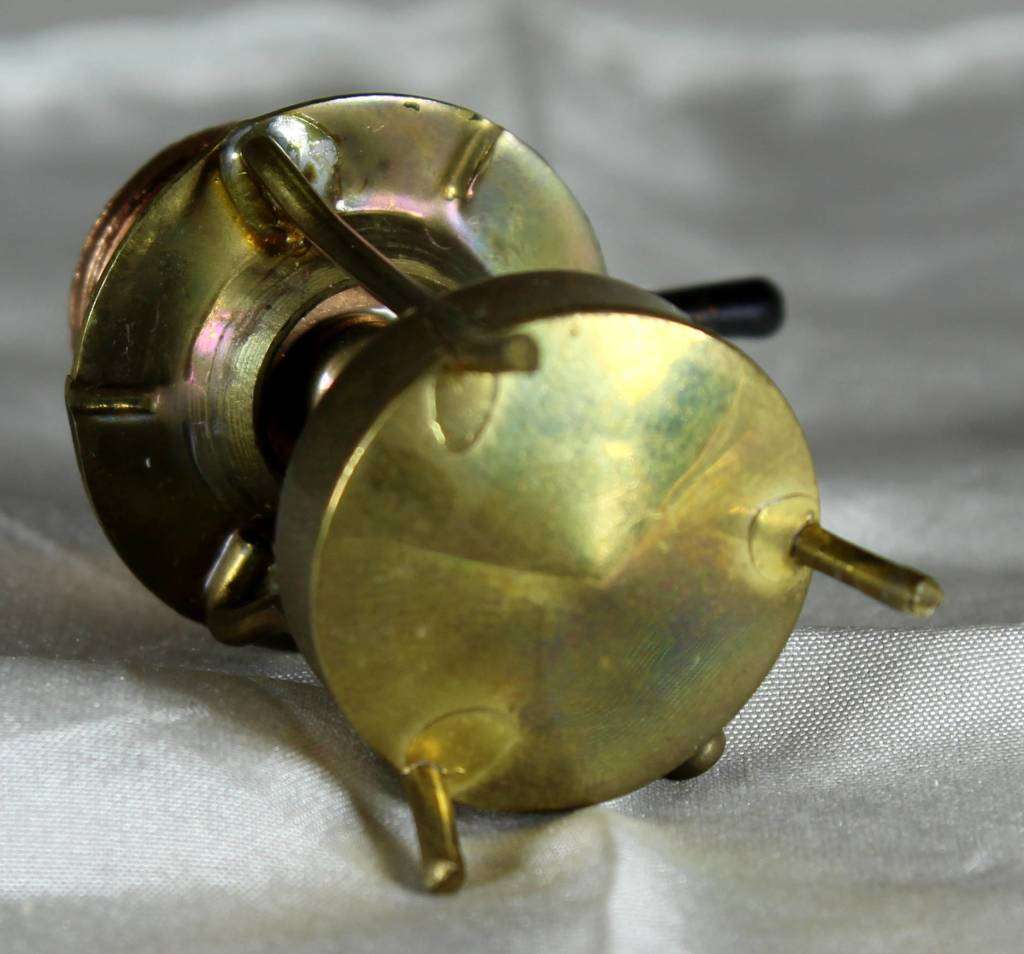 Miniature brass gas stove with pot