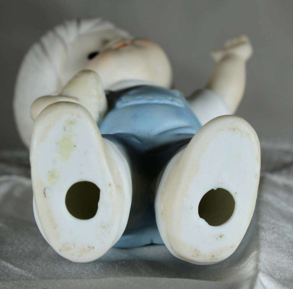Vintage little boy with rugby ball