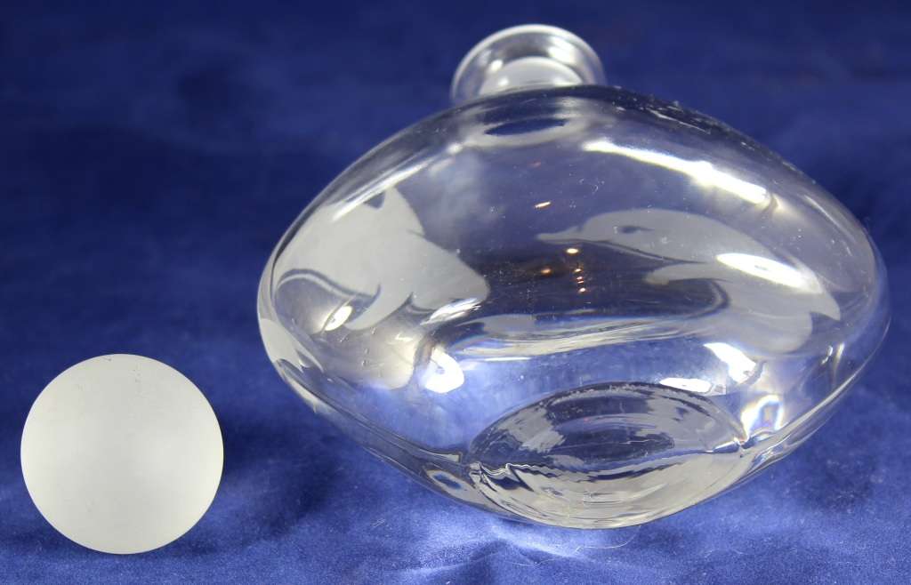 Scent bottle with dolphins