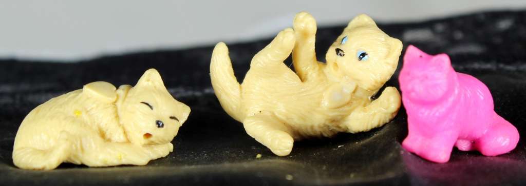 Miniature trio of cats