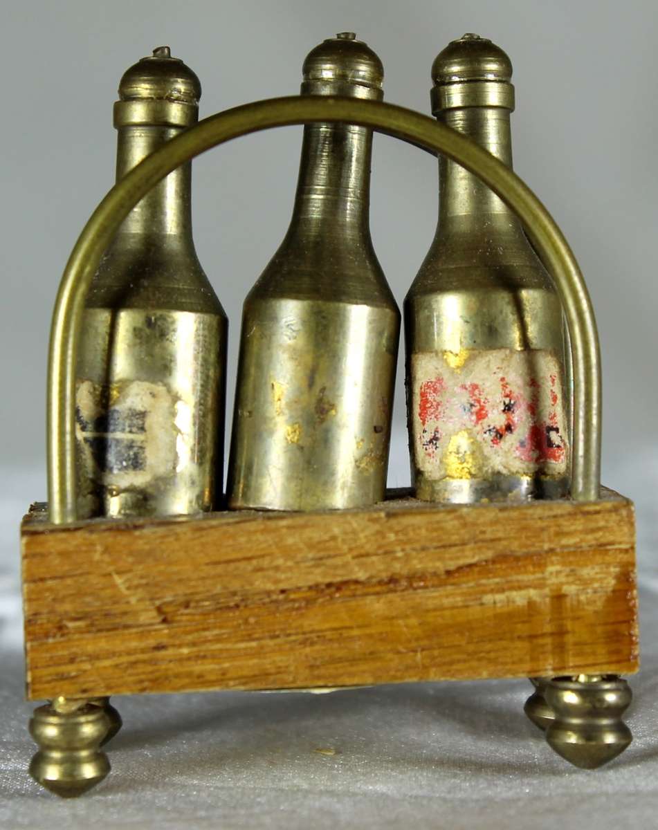Miniature brass liquor Tantalus