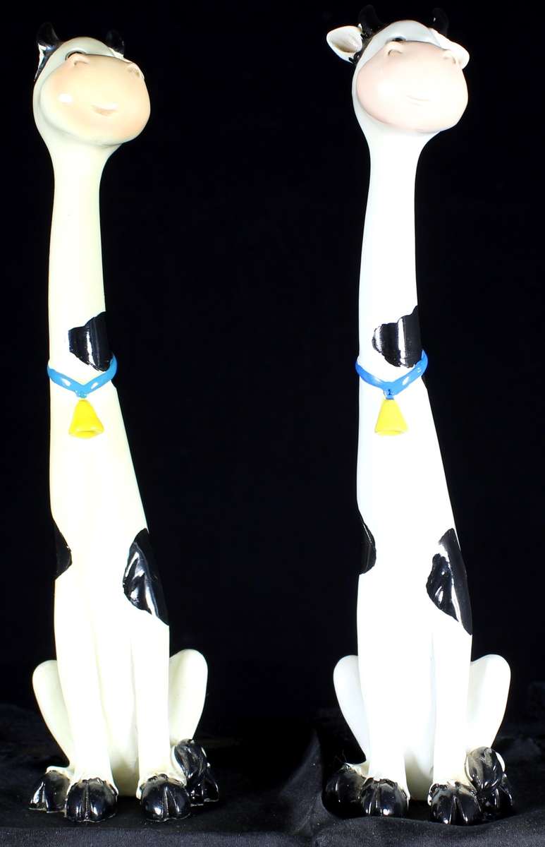 Pair of Cows with Long Necks