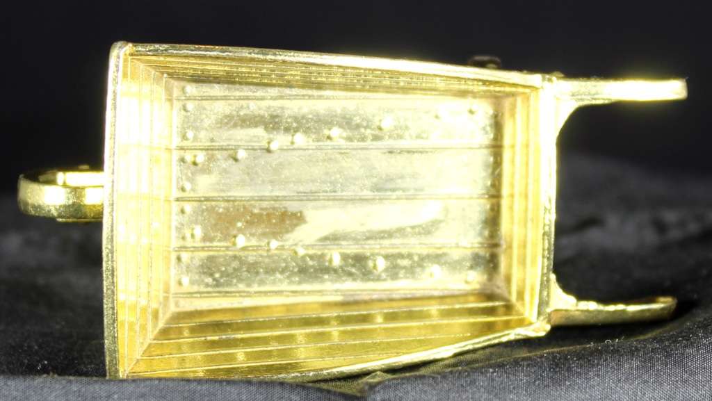 Miniature brass wheelbarrow