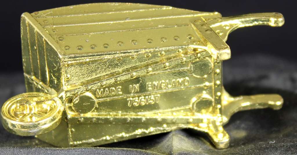 Miniature brass wheelbarrow