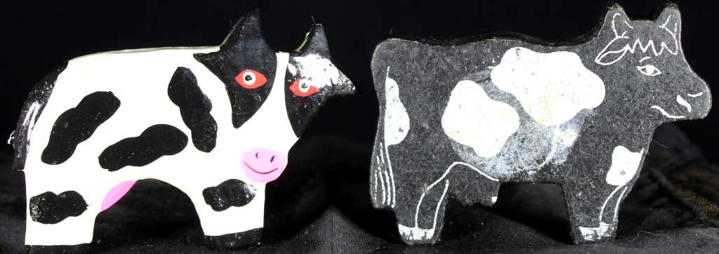 Pair of small wooden cows