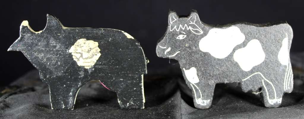 Pair of small wooden cows