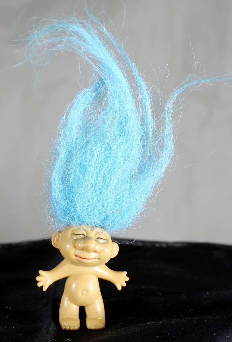 Miniature troll with powder blue hair