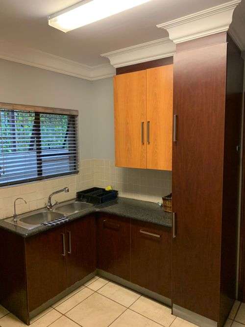 Kitchen cupboards with granite top