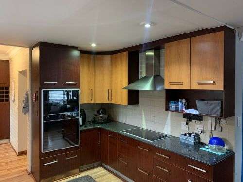 Kitchen cupboards with granite top