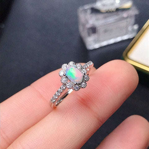 Glamorous 0.50cts Genuine Opal Ring in 925 Silver - Ring size adjustable.