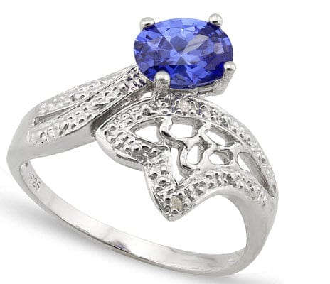 Glamorous 0.61cts Genuine Tanzanite and 0.01cts Diamond Ring in 925 Silver .. A STUNNING STYLE.  WOW