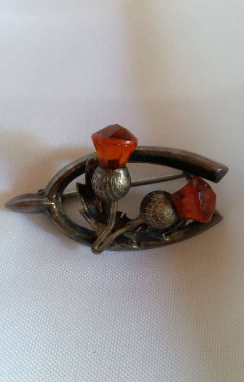 A Vintage Brooch with flowers -  "made in Britain" & "Sterling Silver" with markings. Must see