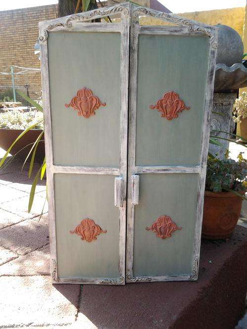 A pretty "Shabby Chic" cupboard.  so chic and so shabby- Another stunner.
