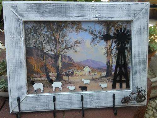 A vintaged shabby framed coat hanger farmyard scene. So unique - one-of-a-kind.