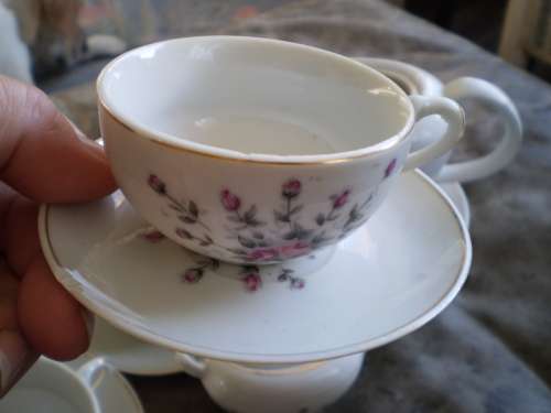 Vintage set of 5 floral miniature cups and saucers, plates one teapot and sugar pot
