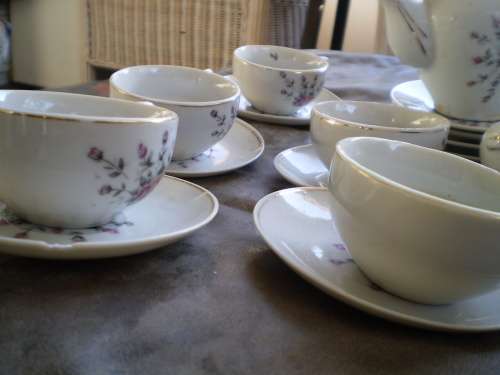 Vintage set of 5 floral miniature cups and saucers, plates one teapot and sugar pot