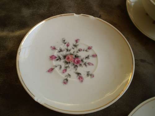 Vintage set of 5 floral miniature cups and saucers, plates one teapot and sugar pot