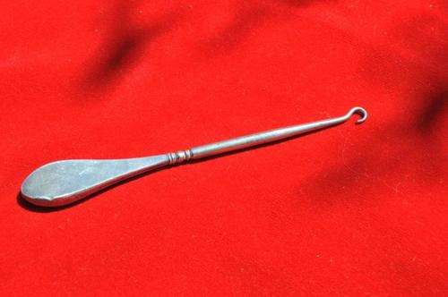 AMAZING ANTIQUE CORSET HOOK WITH STERLING SILVER HANDLE