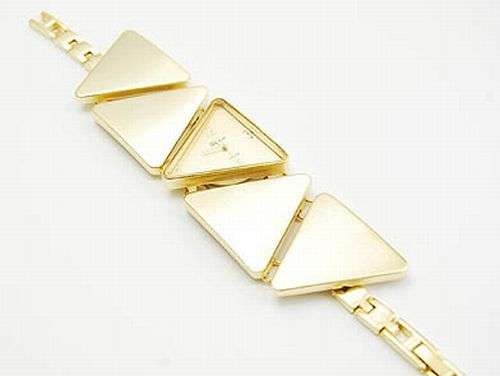 MAT GOLD COLOR - TRIANGLE SHAPED - LADIES TOGGLE GENEVA PLATINUM WATCH