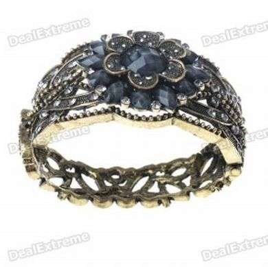 BLACK LUCITE BEADS IN FLOWER DESIGN - MOUNTED ON BRONZE COLOR BANGLE