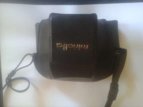 Minolta srt100x with case with extra lenses