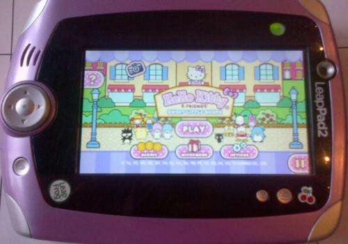 Pink LeapPad 2 Console, silicone sleeve + games