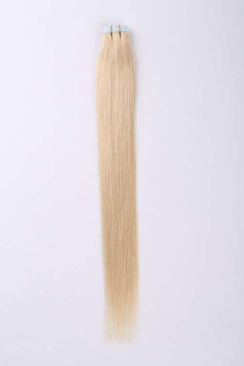 Tape-on hair extensions 14-26 inches mid color