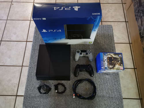 Playstation 4 500GB Plus 2 Remotes And 9 Games