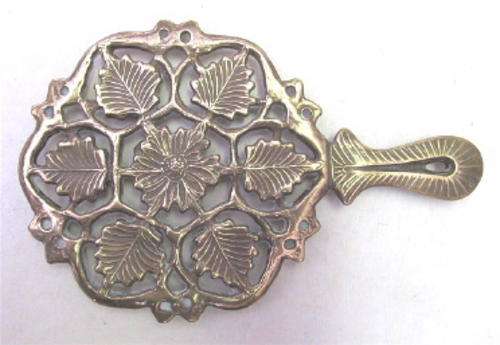 Vintage solid brass trivet