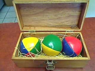 Juggling Balls in Wooden Box