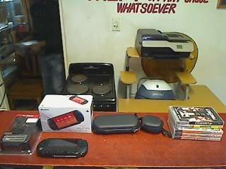 Sony PSP + 3 Games +2 Movies +Car Charger + Pouches + 4GB Memory Stick