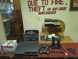 Sony Playstation 3 (160GB) + 2 x Controls + 2 x Move Controls + 9 Games and cables