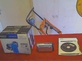 Sony DCR=SX44E Video Camera + Recorder including Charger + Cables + CDs + Manuals + Pouch and Box +