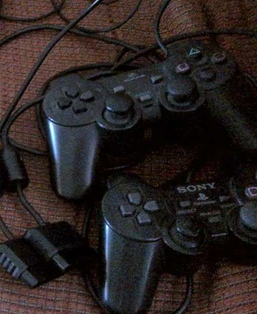 PlayStation 2 plus EXTRAS EXTRAS