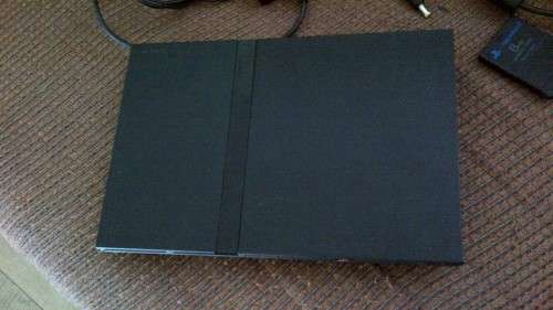 PlayStation 2 plus EXTRAS EXTRAS