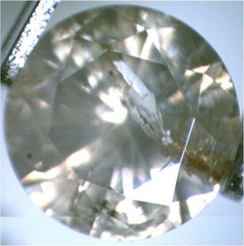 0.84ct; M; I2 CERTIFIED ROUND BRILLIANT DIAMOND