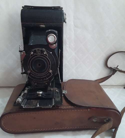Kodak  -  Pocket Kodak in Leather bag.